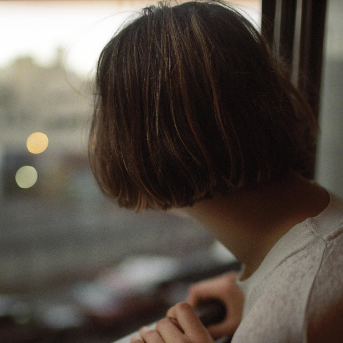 A person looking out the window