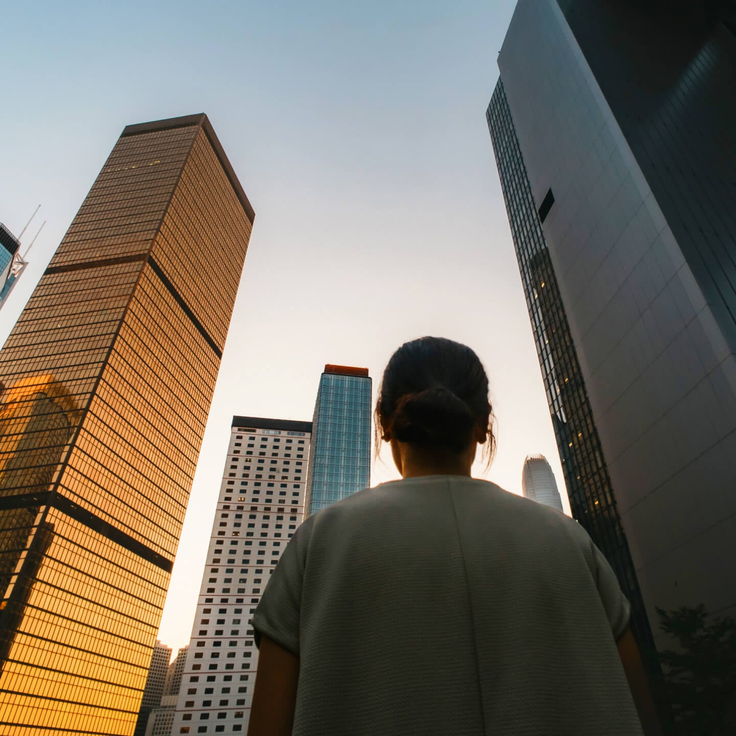 Grow your super A business women looking up at buildings
