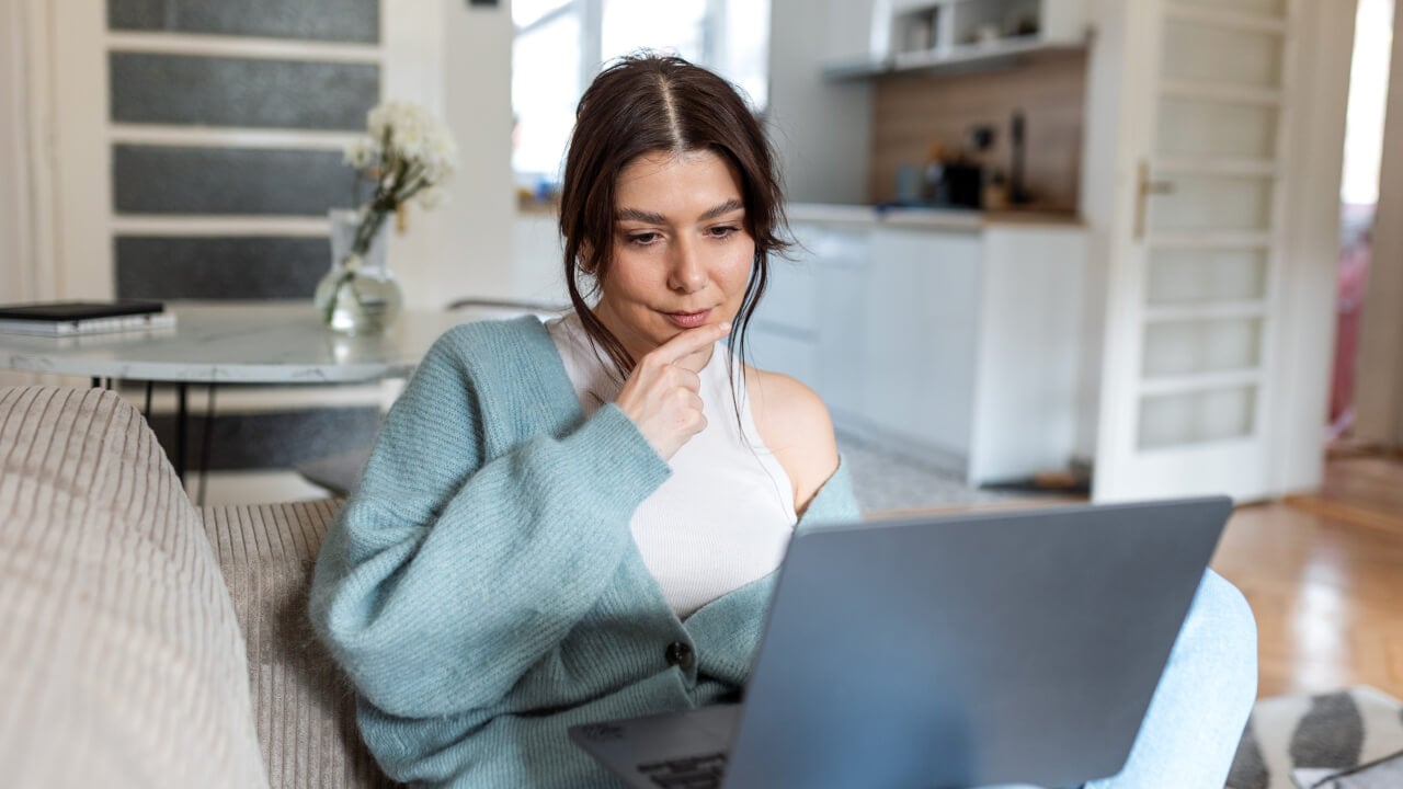 Do you need to give yourself a half-time super rev-up A person working on their laptop seeing how they can maximise super opportunities
