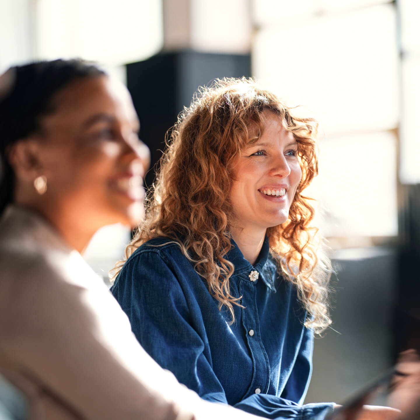 Two women in office