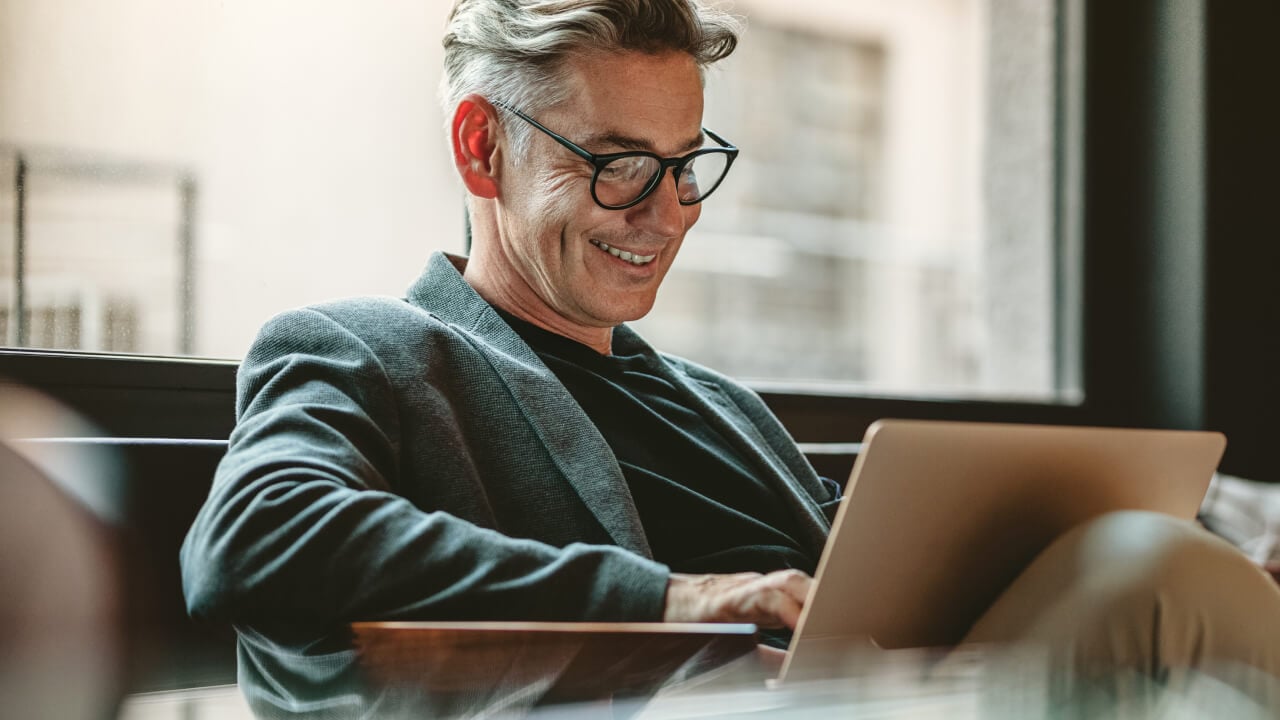 A man comparing types of super funds